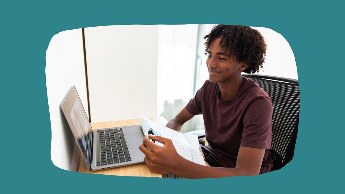 A young person is in an online session. He's smiling and looks like he's engaged in an interesting data conversation.